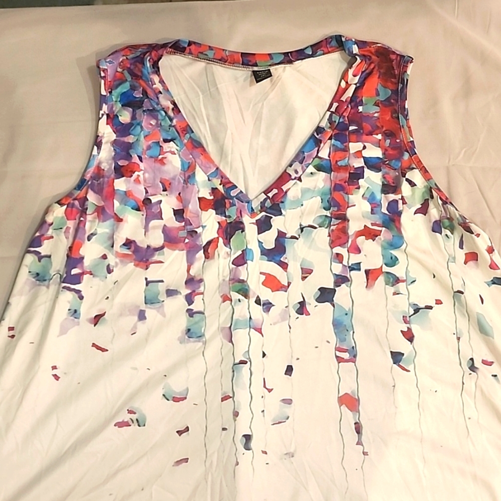 White and colorful sleeveless blouse